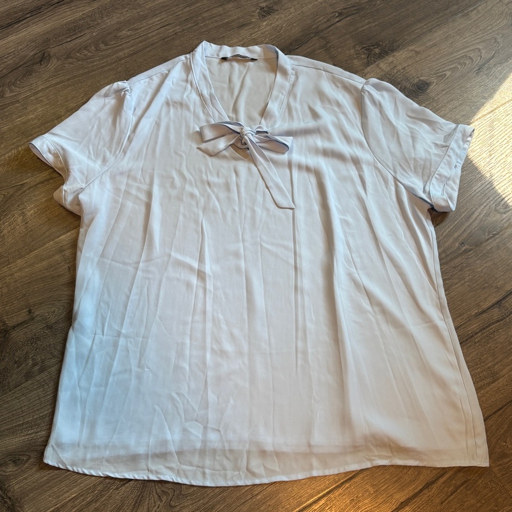 Light Blue Women’s Top with Bow Detail